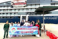 Cérémonie d'accueil des croisiéristes internationaux. Photo: VNA