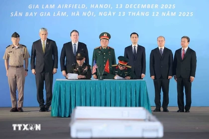 Cérémonie de signature pour le 171e rapatriement des ossements de militaires américains. Photo: VNA