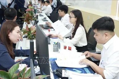 Le 31 décembre au matin, le Comité populaire de Hô Chi Minh-Ville a procédé au lancement du Centre municipal de service administratif public. Photo : VNA