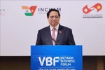Le Premier ministre Pham Minh Chinh s'exprime au VBF. Photo: VNA