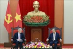 Le secrétaire général du Comité central du Parti communiste du Vietnam To Lam (droite) et le PDG du Conseil des affaires États-Unis-ASEAN, Ted Osius. Photo : VNA 