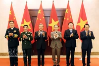 Les ministres des Affaires étrangères, de la Défense et de la Sécurité publique du Vietnam et de la Chine lors de la premier réunion du Dialogue stratégique « 3+3 ». Photo : VNA