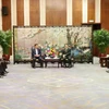 Le Vice-Premier ministre Nguyên Chi Dung (à gauche) et Zhang Hu, vice-gouverneur exécutif de la province du Guangdong. Photo : VNA