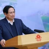 Le Premier ministre Pham Minh Chinh lors de la réunion. Photo: VNA