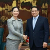 Le Premier ministre Pham Minh Chinh et Cham Nimul, ministre du Commerce du Cambodge; Photo: VNA