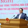 Le Premier ministre Pham Minh Chinh s’exprime lors de la conférence. Photo : VNA