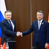 Le Premier ministre Le Minh Hung et le directeur général de Rosatom, Alexey Likhachev. Photo: VNA