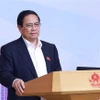 Le Premier ministre Pham Minh Chinh lors de la réunion. Photo: VNA