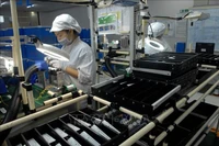 Le Vietnam entre dans une nouvelle phase de développement avec l’ambition de devenir un pays développé à revenu élevé d’ici 2045. Photo : VNA