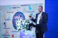 Le professeur Kurt Kremer de l'Institut Max Planck au séminaire. Photo: VNA