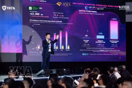 Phan Duc Trung, président de l'Association de la blockchain et des actifs numériques du Vietnam (VBA), partage son point de vue sur la nécessité de construire une infrastructure de confiance pour le marché des actifs numériques lors du Sommet sur la tokenisation d'actifs réels au Vietnam 2026 (Vietnam RWA Summit 2026). Photo: VNA