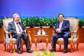 Le secrétaire général des Nations Unies, António Guterres et le Premier ministre Pham Minh Chinh (droite). Photo: VNA