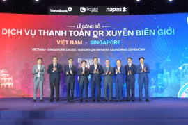 Lancement du service de paiement transfrontalier par QR code entre le Vietnam et Singapour. Photo: bnews.vn
