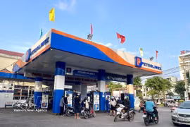 Les mesures de régulation prises par le gouvernement et les ministères ont permis de maintenir la stabilité du marché national. Photo: VNA