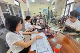 La rationalisation de l'appareil administratif doit s'accompagner d'une révision des procédures, d'une meilleure exploitation des données et d'une amélioration des services destinés aux citoyens et aux entreprises. Photo: VNA
