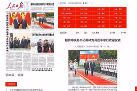 Le Quotidien du Peuple consacre sa première page du 15 avril à des articles sur la visite du leader Xi Jinping au Vietnam. Photo: paper.people.com.cn