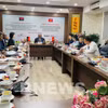 Réunion entre des représentants du Centre national de vulgarisation agricole (NAEC) du Vietnam et la délégation du ministère angolais de l’Agriculture et des Forêts, conduite par son ministre Isaac Francisco Maria dos Anjos. Photo: VNA