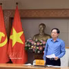 Le vice-Premier ministre Ho Quoc Dung préside la 35e réunion du Comité national de pilotage sur la lutte contre la pêche illicite, non déclarée et non réglementée (INN) et le développement durable de la pêche. Photo: VNA