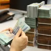 Les recettes budgétaires provenant des activités d'import-export ont progressé de 18,7 % au cours des sept premiers mois de 2026. Photo: Vietnam+