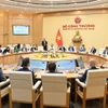 Lors de la réunion. Photo: VNA