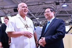 Le Premier ministre Pham Minh Chinh (droite) et son homologue de Tuvalu, Feleti Penitala Teo, en marge de la 3ᵉ Conférence des Nations Unies sur les océans (UNOC 3),. Photo: VNA