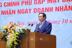 Le Premier ministre Pham Minh Chinh à la rencontre avec des représentants d'entreprises à l'occasion de la Journée des entrepreneurs vietnamiens (13 octobre). Photo: VNA