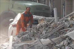 Bâtiments détruits après une frappe aérienne israélienne à Téhéran, en Iran, le 13 juin. Photo : Xinhua/VNA