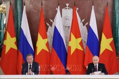 Le secrétaire général du Parti communiste du Vietnam (PCV), Tô Lâm (gauche), et le président russe, Vladimir Poutine. Photo: VNA