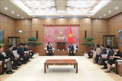 Lors de la rencontre. Photo : VNA