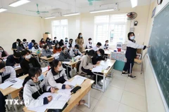 Avec 440 voix favorables sur 441 députés votants, l’Assemblée nationale a adopté la Résolution relative à l’exonération et au soutien des frais de scolarité pour les enfants d’âge préscolaire, les élèves de l’enseignement général et les apprenants suivant des programmes d’enseignement général dans les établissements du système éducatif national. Photo: VNA