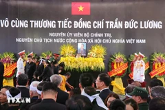 Cérémonie d’inhumation de l’ancien président Tran Duc Luong à Quang Ngai. Photo: VNA