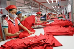 La Sarl Star a investi dans la construction d'une usine spécialisée dans la couture de tricots et de vêtements de sport destinés à l'exportation dans le parc industriel de Phu Nghia, district de Chuong My, à Hanoï. Photo: VNA