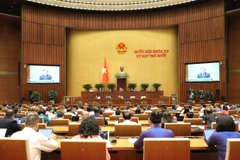 Le président de la Cour populaire suprême du Vietnam, Le Minh Tri, présente le rapport d’activités de la Cour pour le mandat 2021-2026. Photo: VNA