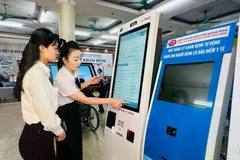 Un kiosque d'enregistrement automatisé à l'hôpital général de la provinciale de Quang Ninh. Photo : VietnamPlus