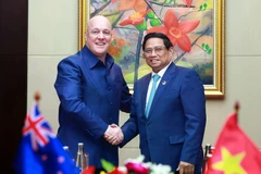 Le Premier ministre Pham Minh Chinh (droite) et le Premier ministre néo-zélandais, Christopher Luxon. Photo: VNA