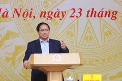 Le Premier ministre Pham Minh Chinh présidé la 14ᵉ réunion de la Comité nationale de lutte contre la pêche illicite, non déclarée et non réglementée. Photo: VNA