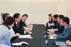 Réunion entre le ministre vietnamien de l'Industrie et du Commerce, Nguyên Hông Diên, et le ministre d'État au Cabinet du Japon, Kazuchika Iwata, à Melbourne. Photo: VNA