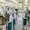 Chaîne de production de Hana Micron Vina, dans le parc industriel de Van Trung. Photo : VNA