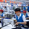 Le textile vietnamien cherche de nouveaux moteurs de croissance à l’export. Photo: VNA