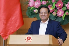 Le Premier ministre Pham Minh Chinh s'exprime lors de la réunion. Photo: VNA