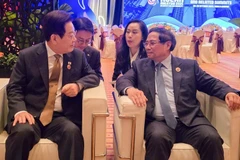 Le Premier ministre Pham Minh Chinh (à droite) et le président sud-coréen Lee Jae Myung. Photo: ministère vietnamien des Affaires étrangères