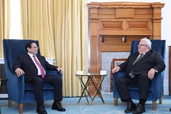 Le Premier ministre Pham Minh Chinh et le président de la Chambre des représentants de Nouvelle-Zélande, Gerry Brownlee. Photo: VNA