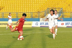 Des jeunes joueuses vietnamiennes (maillot rouge). Photo: VNA