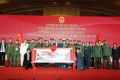 Des délégués lors cérémonie en Chine marquant le 80e anniversaire de la Fête nationale du Vietnam (2 septembre 1945 – 2 septembre 2025). Photo: VNA
