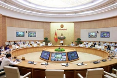 Le Premier ministre Pham Minh Chinh préside une visioconférence avec 34 localités. Photo: VNA