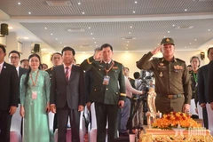 Les délégués vietnamiens lors de la cérémonie. Photo: qdnd.vn