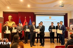 Les délégués présennts au séminaire. Photo: VNA