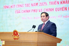 Le Premier ministre Pham Minh Chinh s'exprime lors de la conférence. Photo: VNA