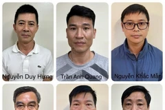 Des accusés liés à l'affaire du groupe Thuân An. Photo: VNA