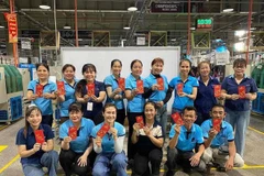 Les employés d'une compagnie installée dans la province de Dong Nai. Photo: Fédération du Travail de Dong Nai